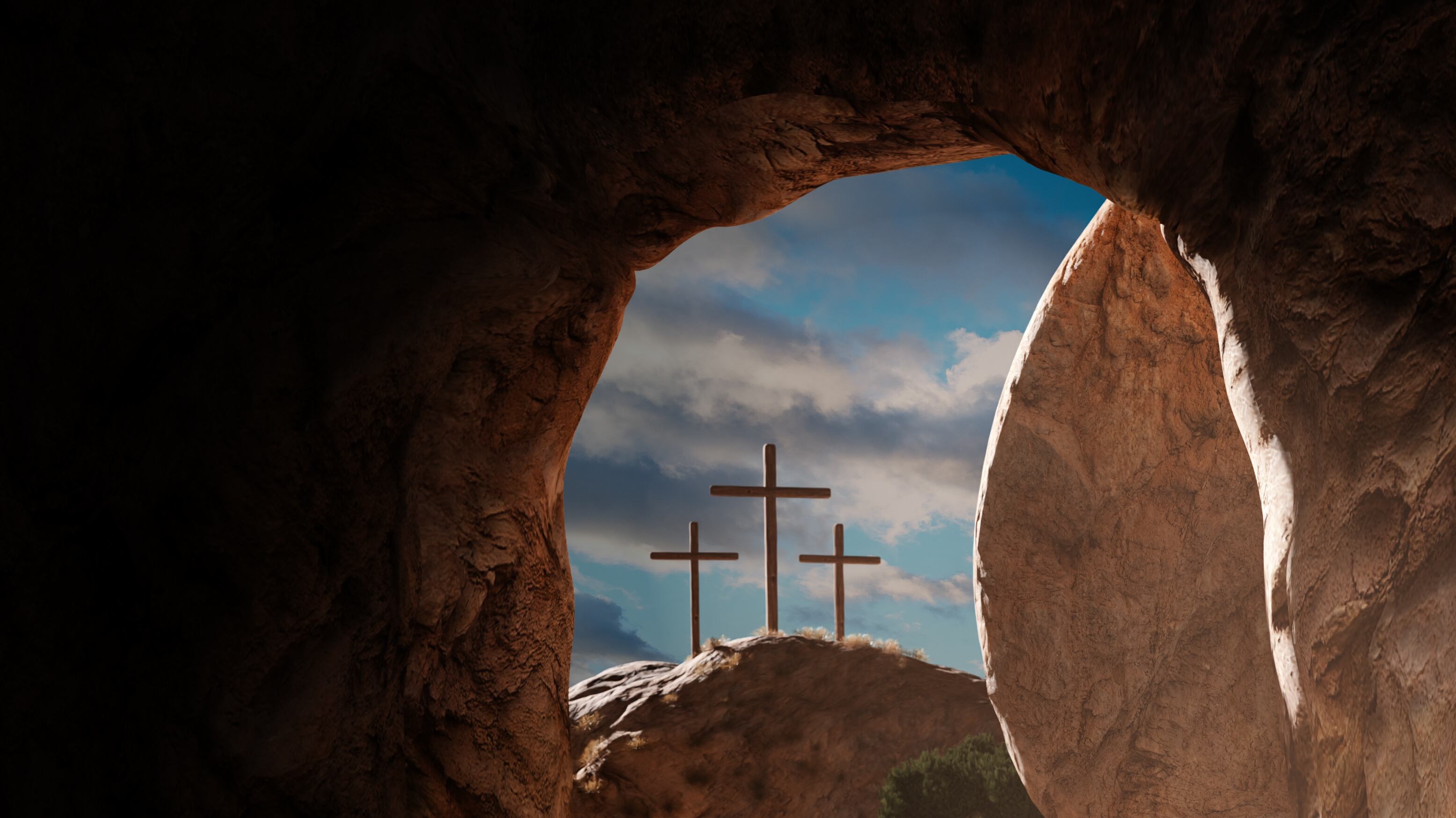 Crucifixion and Resurrection. Empty tomb of Jesus with crosses in the background. Easter or Resurrection concept.
